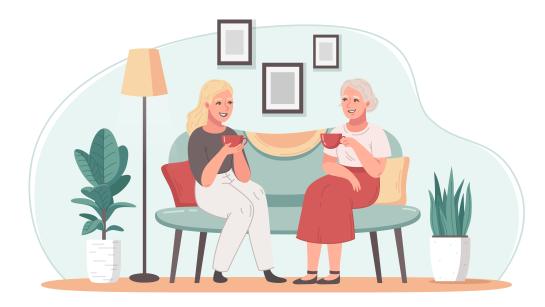 twee dames die gezellig koffie drinken 